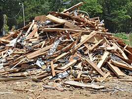 large pile of scrap wood on construction site