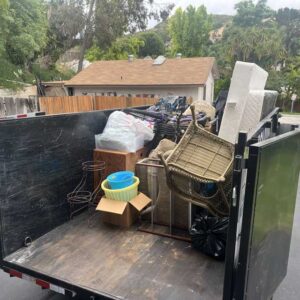 junk removal trailer with a half-load of trailer fill in Santee, CA