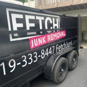 junk removal trailer in Santee, CA with back door open